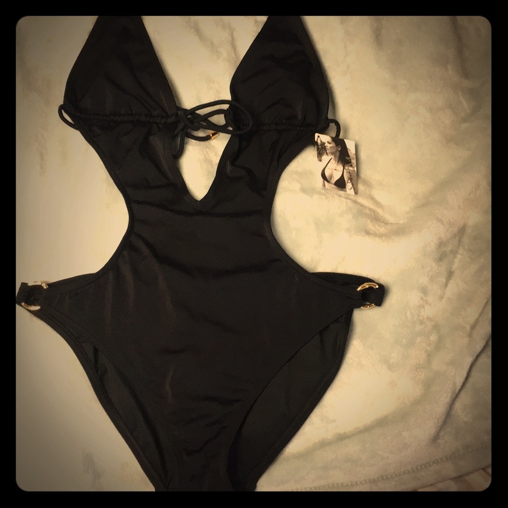 Brand new never worn cut out one piece! Very sexy!
